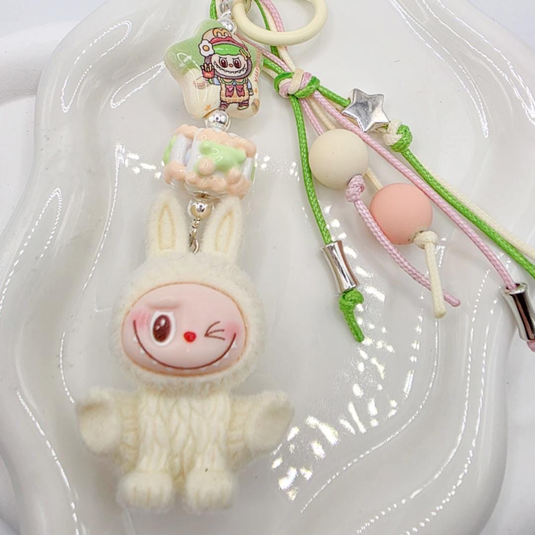 StudioNisy Handmade Cute Faced Labubu Furry large bean with beaded cord, cellphone or bag charm
