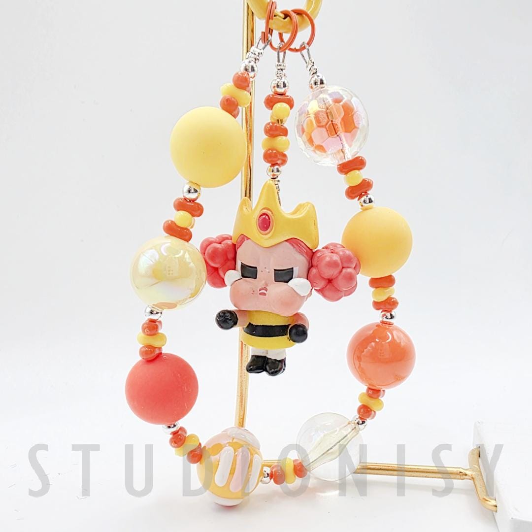 StudioNisy Mini Bean Crybaby Crying Again handmade custom medium sized bean beaded keychain or phone charm