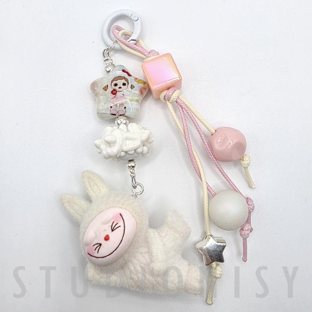 StudioNisy Handmade Cute Faced Labubu Furry large bean with beaded cord, cellphone or bag charm