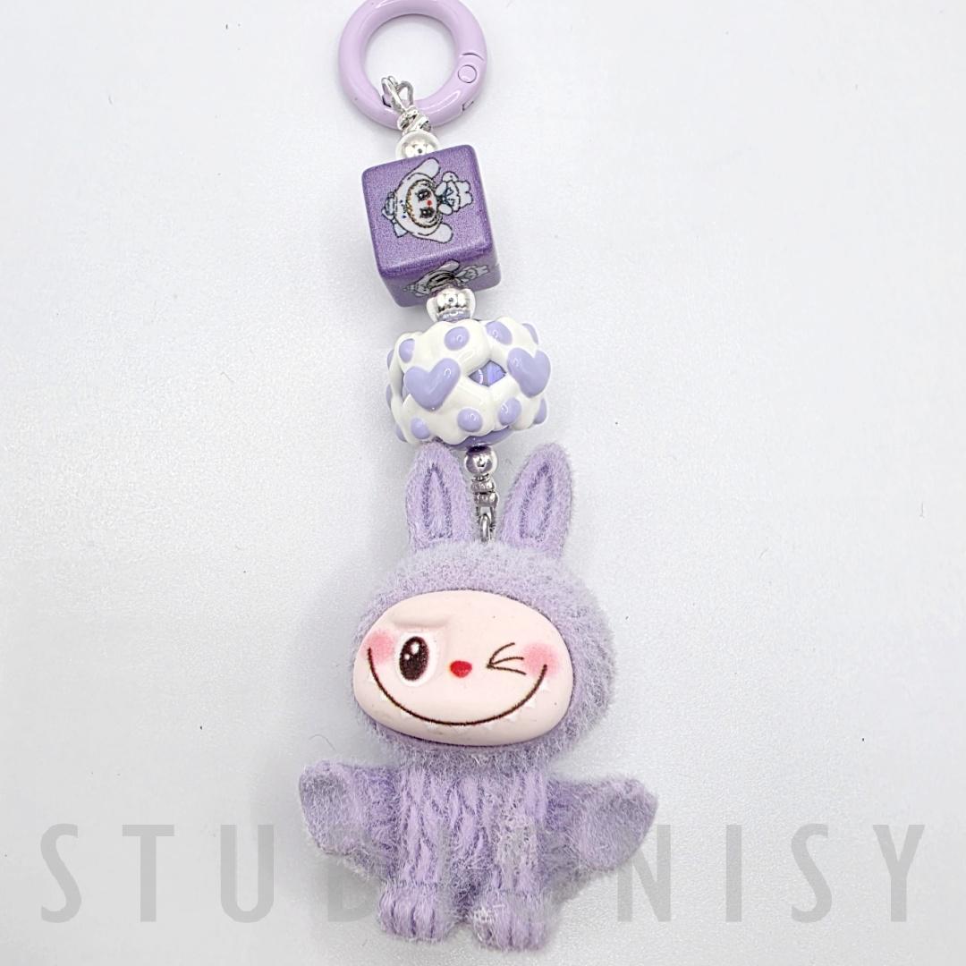 StudioNisy Handmade Cute Faced Labubu Furry large bean with beaded cord, cellphone or bag charm