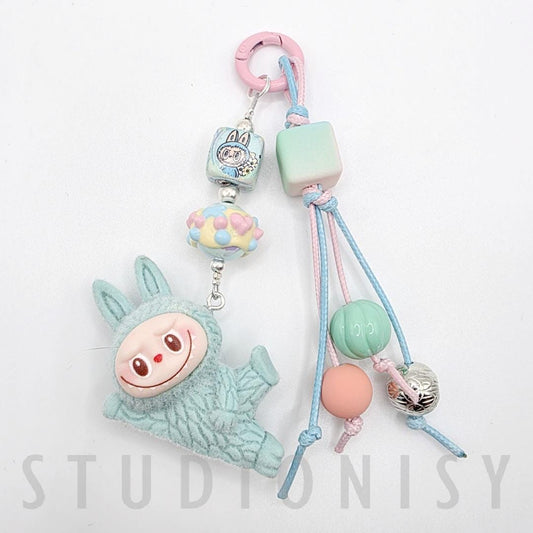 StudioNisy Handmade Cute Faced Labubu Furry large bean with beaded cord, cellphone or bag charm